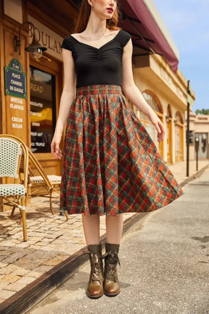 Holiday plaid doris high waisted cotton flare skirt with pockets featuring a red green and beige woven plaid pattern