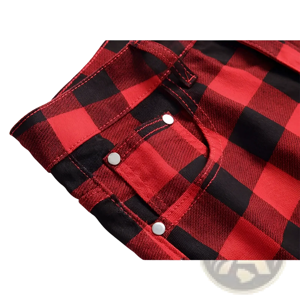 Red plaid slim fit denim jeans featuring red and black plaid pattern with silver snap buttons on denim material