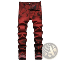 Red plaid slim fit denim jeans featuring red tie-dye fabric with dark splatter patterns and rolled cuffs