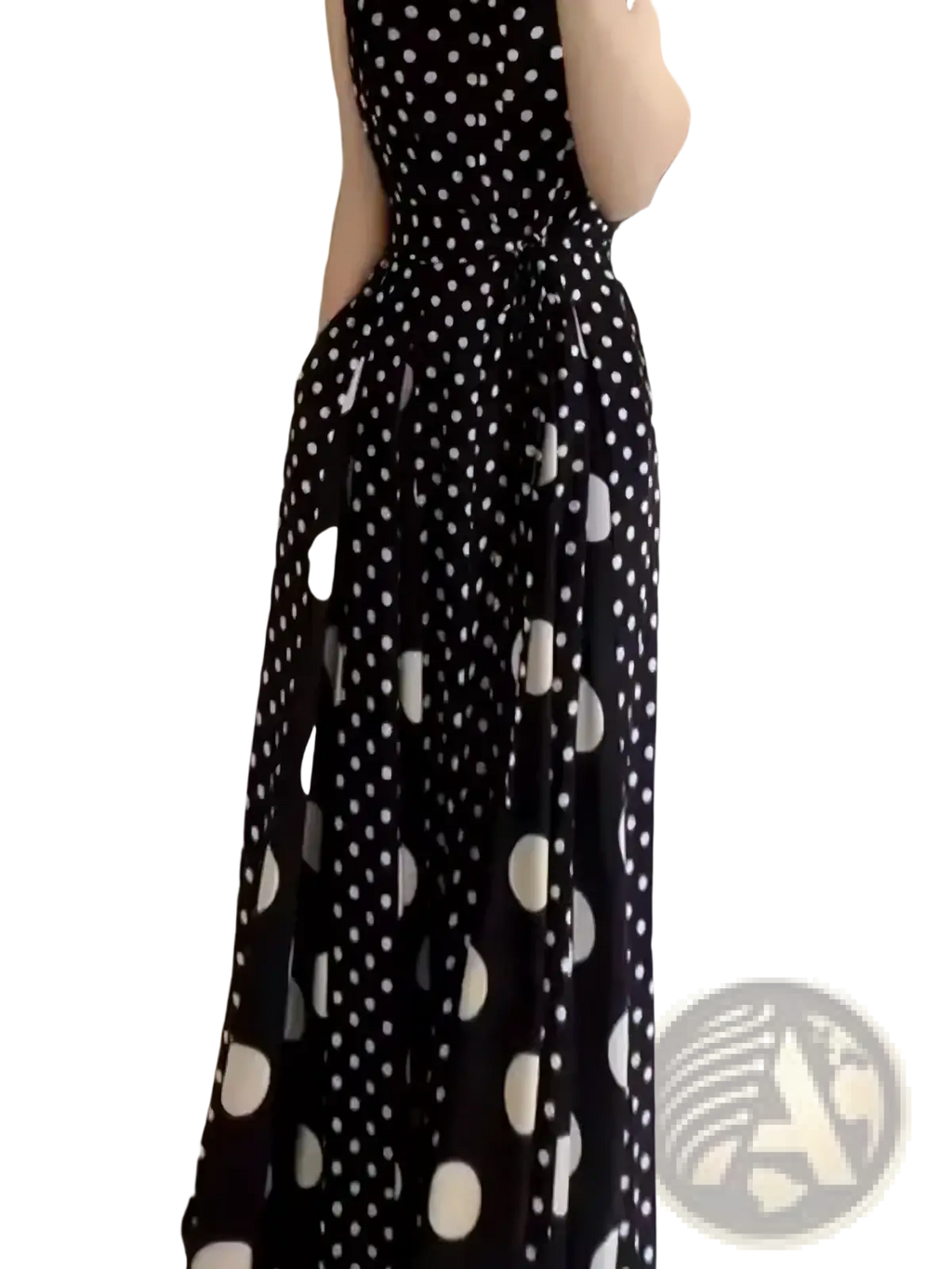 Black and white polka dot maxi dress with fitted bodice and flowing skirt for formal occasions