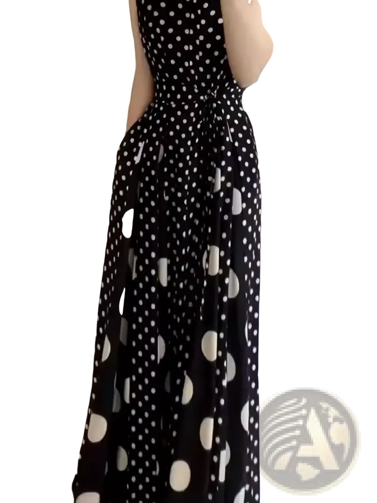 Black and white polka dot maxi dress with fitted bodice and flowing skirt for formal occasions