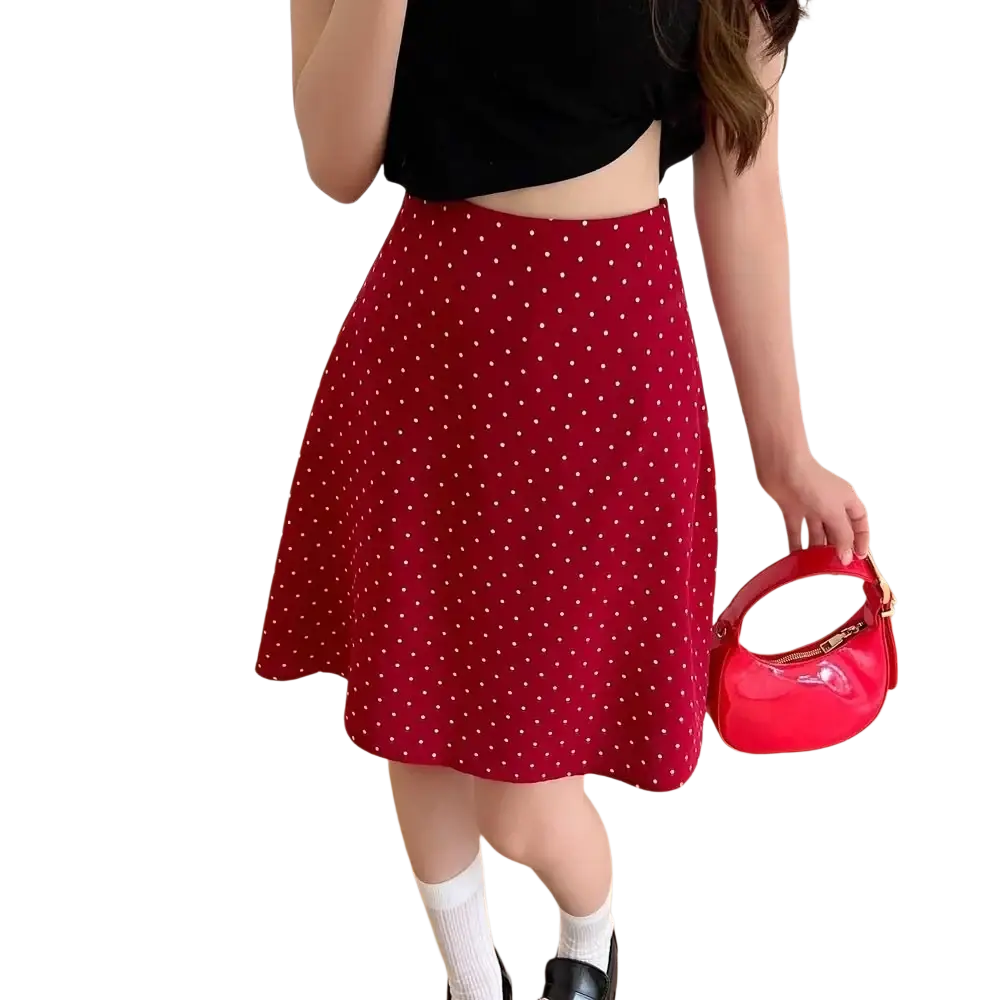 Red polka dot a-line midi skirt with white dots and a flared hem perfect for casual and semi-formal wear