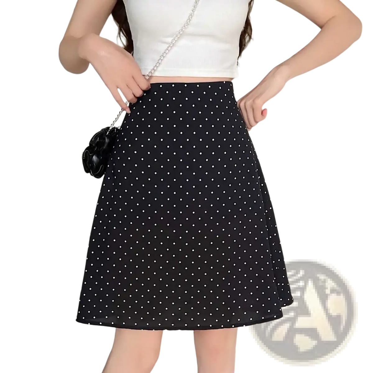 Black a-line midi skirt with white polka dots and flared hem contrasting the red polka dot design