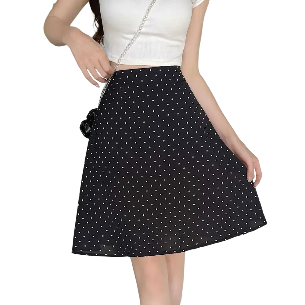 Black a-line skirt with white polka dots and a fitted waistband in a red polka dot a-line midi skirt product image