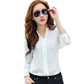 White long-sleeved button-up blouse with classic collar and rolled cuffs for office wear