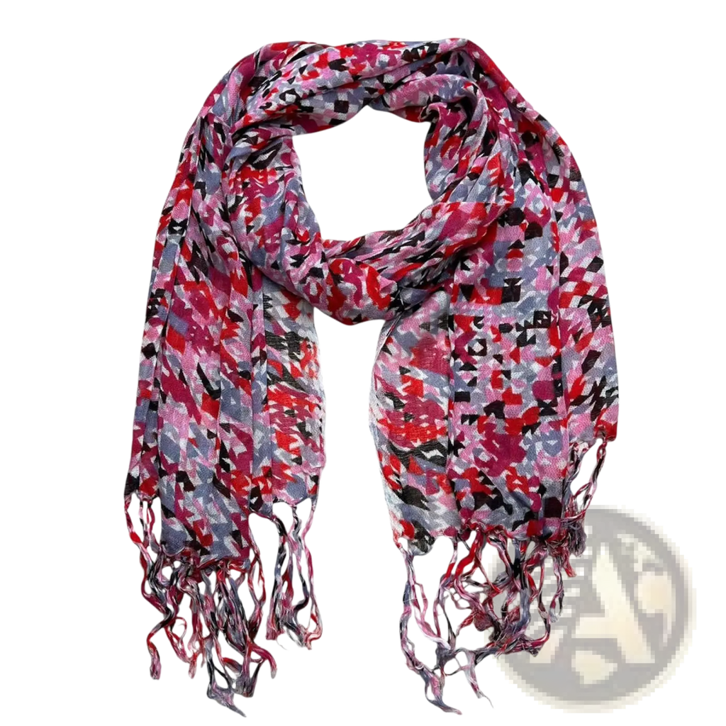 A vibrant red viscose flowy long scarf with a red gray and black pattern and fringed ends for dresses