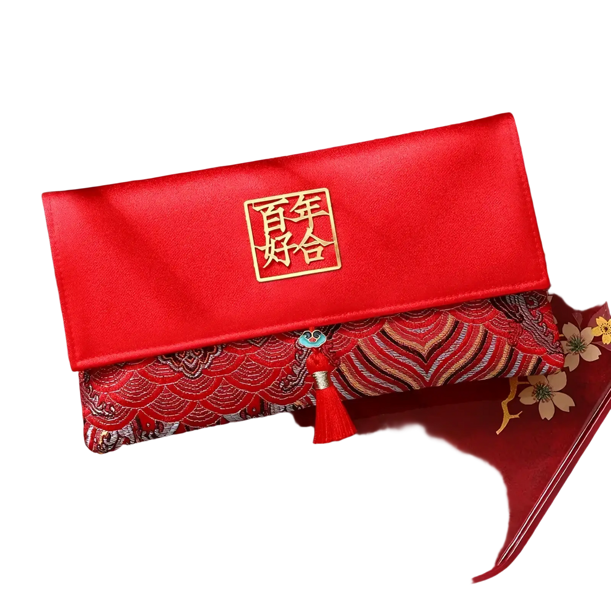 Red wedding envelope satin money gift bag featuring a red satin clutch with gold embroidered seal and red tassel accent