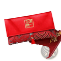 Red wedding envelope satin money gift bag featuring a red satin clutch with gold embroidered chinese characters and tassel