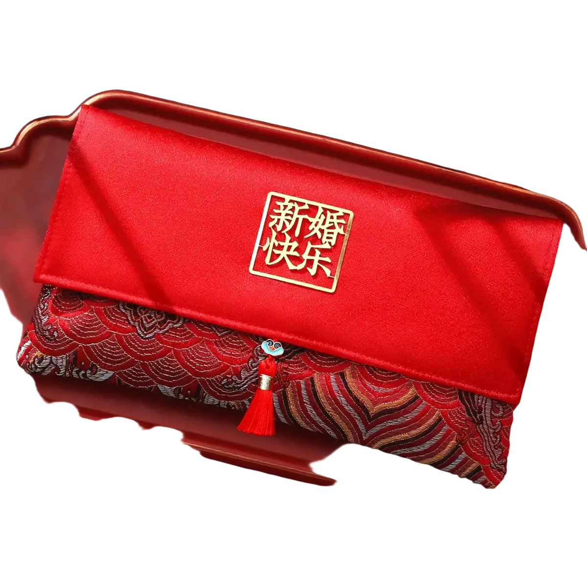Red wedding envelope satin money gift bag with gold xin hun kuai le emblem and red tassel decoration