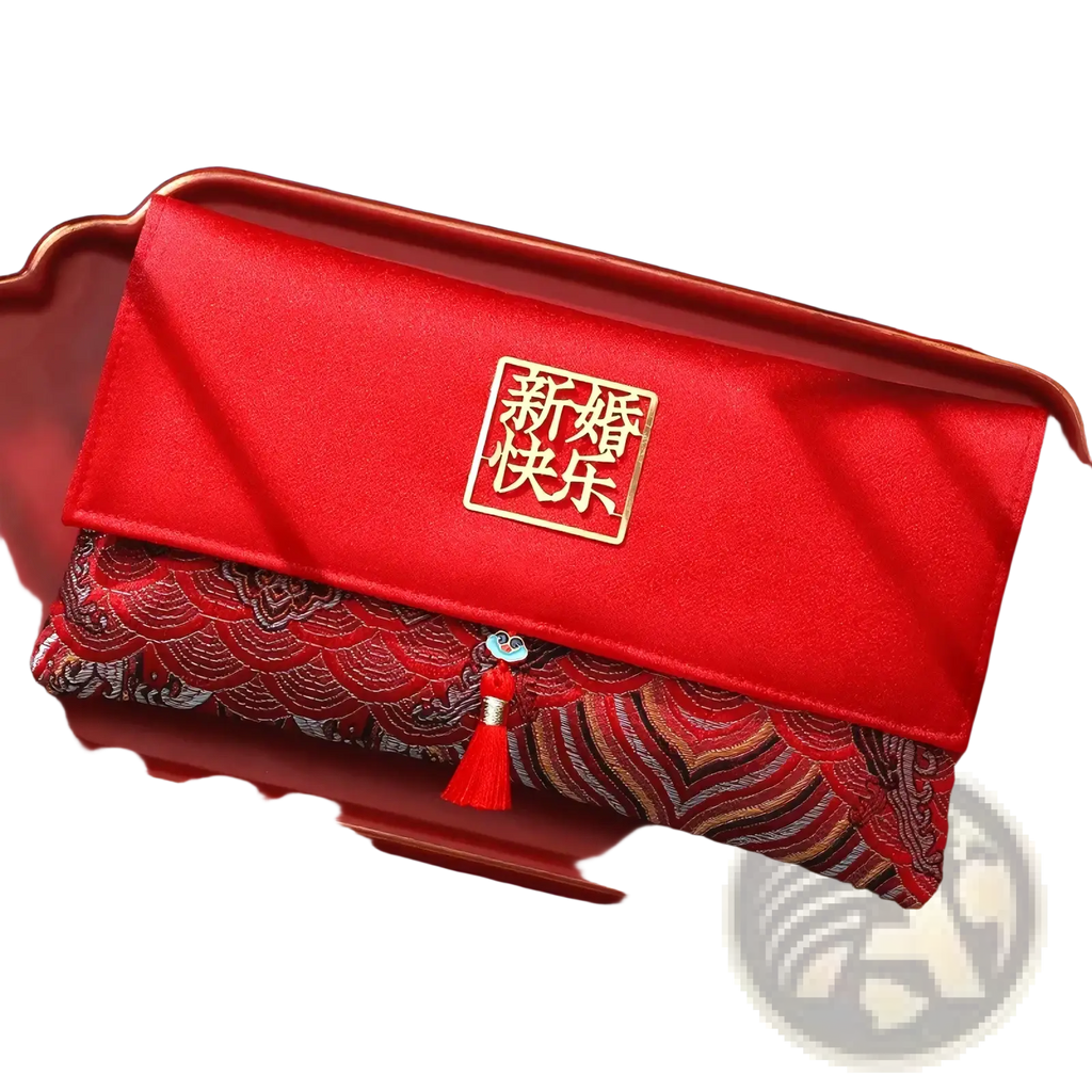 Red wedding envelope satin money gift bag with gold xin hun kuai le emblem and red tassel decoration