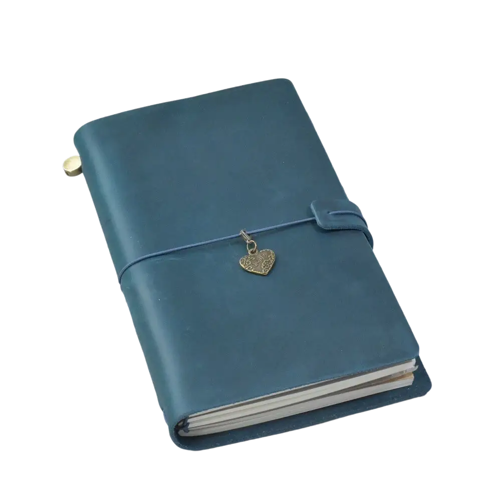 Teal refillable genuine leather travel journal notebook with gold heart charm and matching strap for travel use