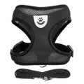 Reflective black mesh cat harness with white paw print emblem and matching leash adjustable for chest circumference