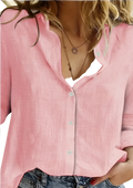 A soft pink relaxed fit textured linen long sleeve button up shirt with subtle vertical stitching