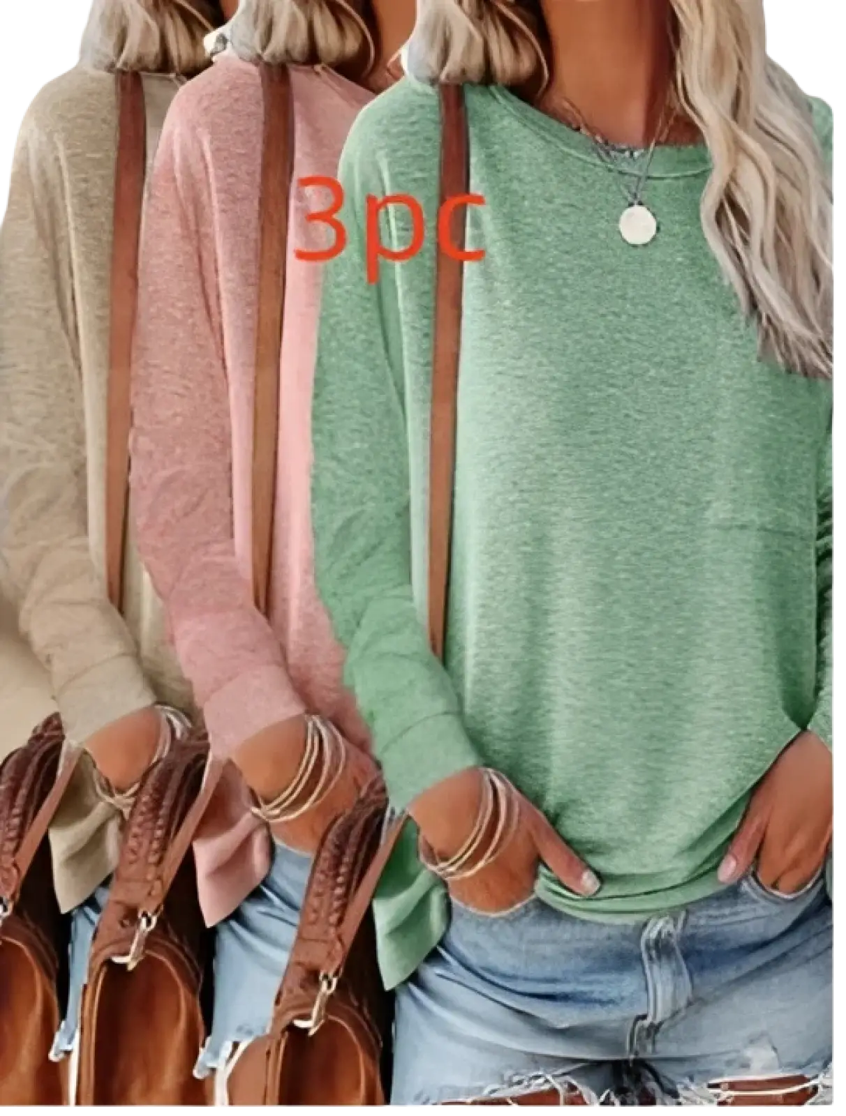 A relaxed fit heathered green knit long sleeve t-shirt with subtle texture and pocket detail