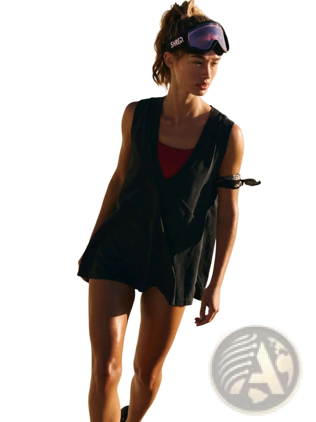 Relaxed v neck sleeveless cotton wrap vest top in black with red inner lining and subtle patterned strap detail