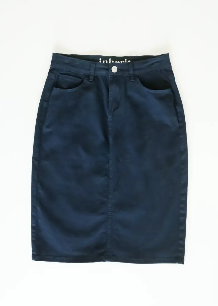 Remi navy high waisted stretch denim midi pencil skirt in dark navy blue with a fitted silhouette and front pockets
