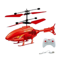Red remote control helicopter with black rotor blades and white controller designed for indoor use with LED lights