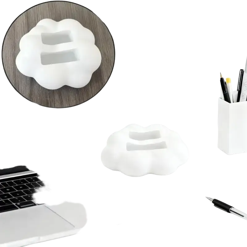 White cloud-shaped remote control holder with smooth matte finish designed as a desktop organizer stand