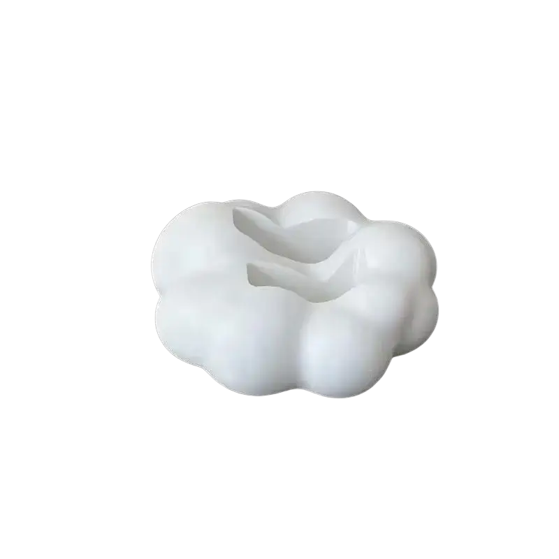 White cloud-shaped silicone remote control holder with central opening for desktop organizer stand