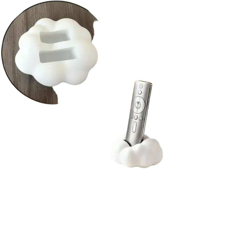 White cloud-shaped remote control holder with silver tv remote for desktop organizer stand and control holder use