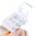White plastic remote control organizer desktop storage rack with wavy segmented egg carton design