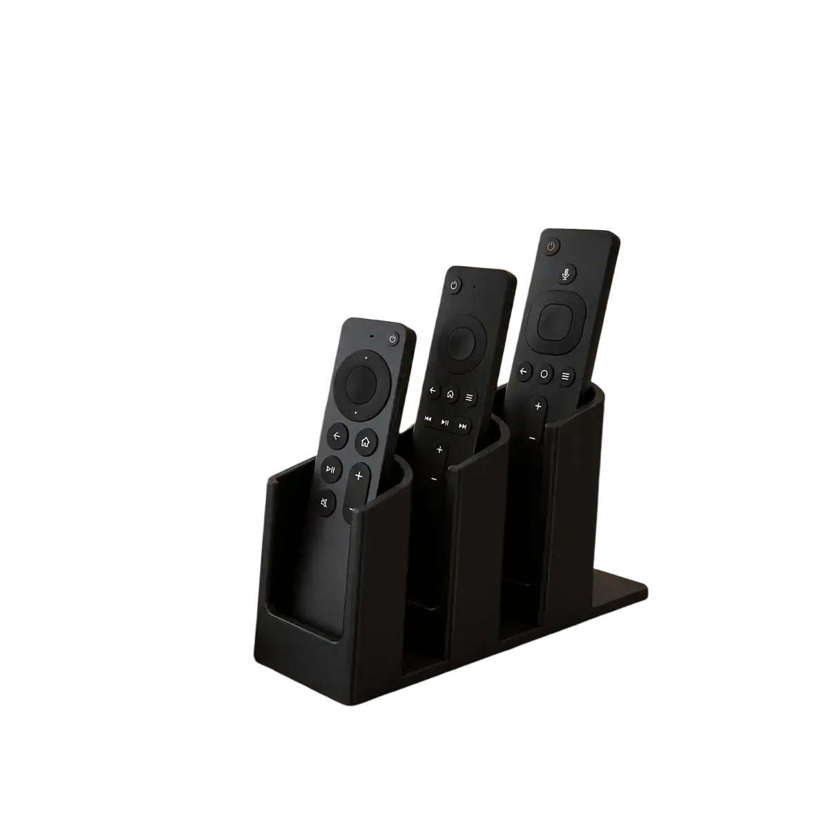 Black plastic remote control organizer with three slots holding multiple black remotes for convenient storage
