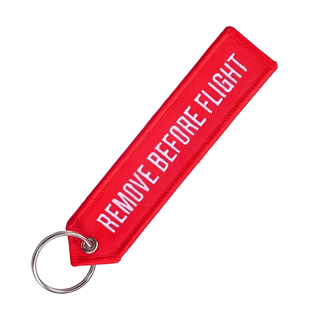 Red embroidered remove before flight keychain with white lettering designed for aviation safety use