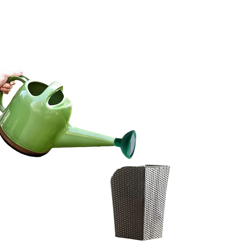 A vibrant green ceramic replacement shower head with brown rubberized base providing water output for garden watering