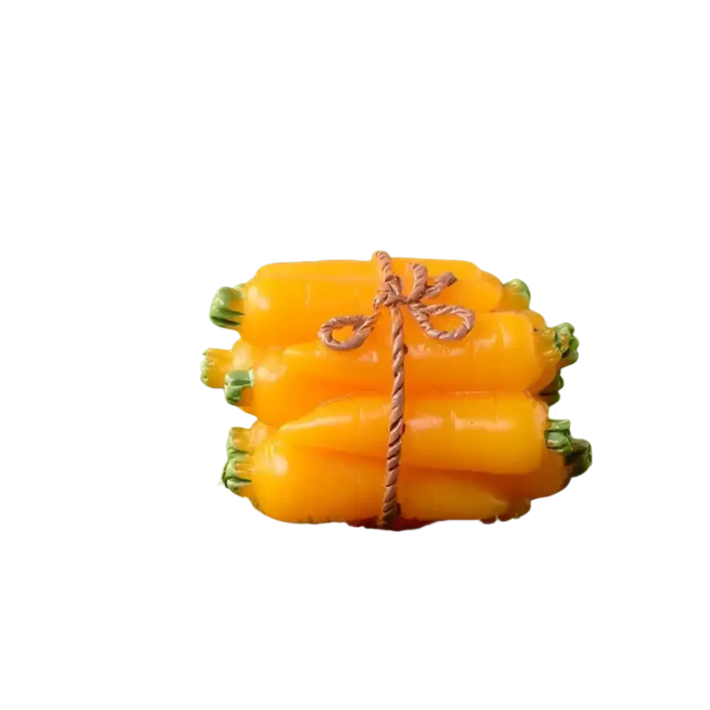 A bundle of vibrant orange glossy plastic carrots tied with rustic twine for a resin bunny easter garden figurine
