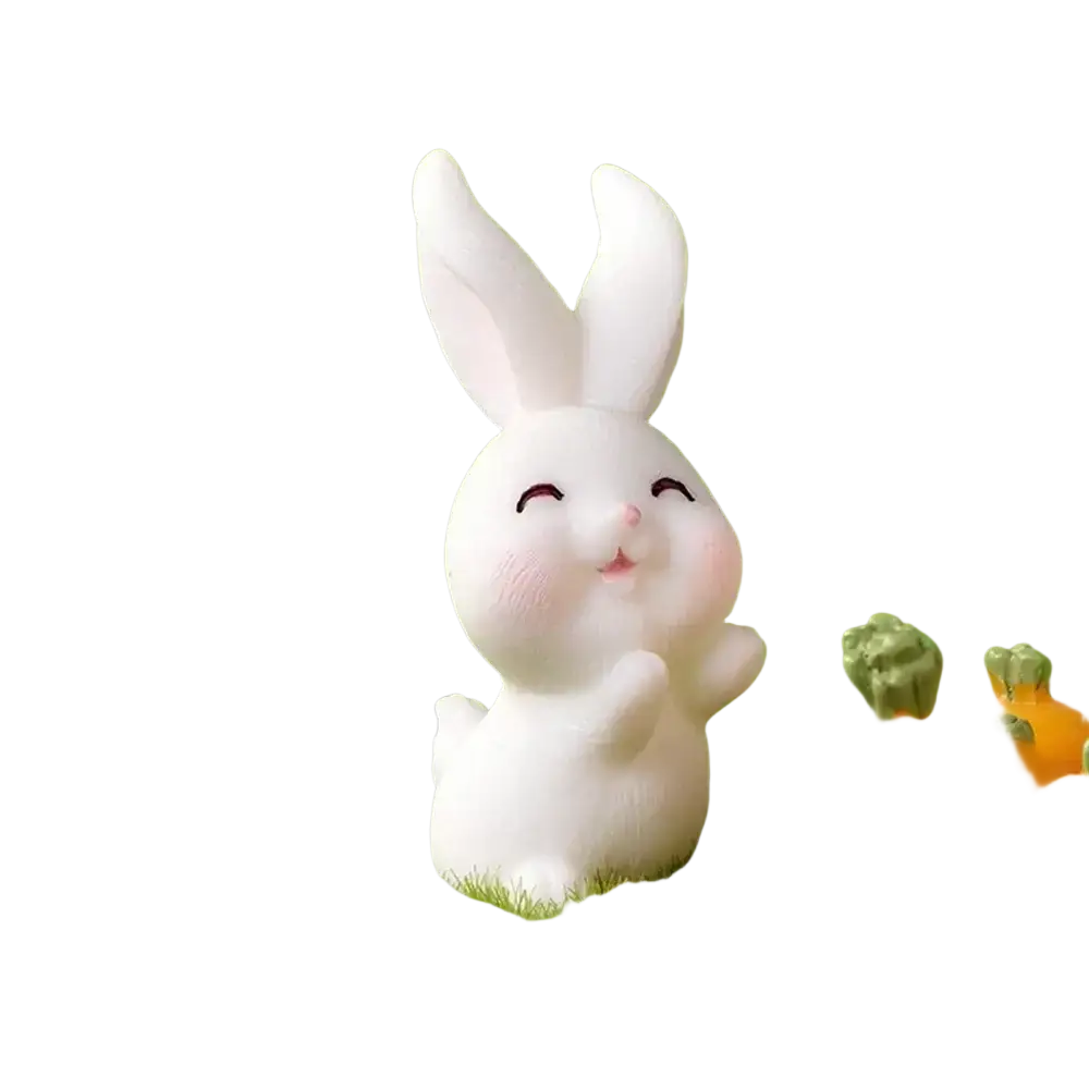 A cute white resin bunny figurine with closed eyes and pink cheeks standing on green grass for easter garden decor