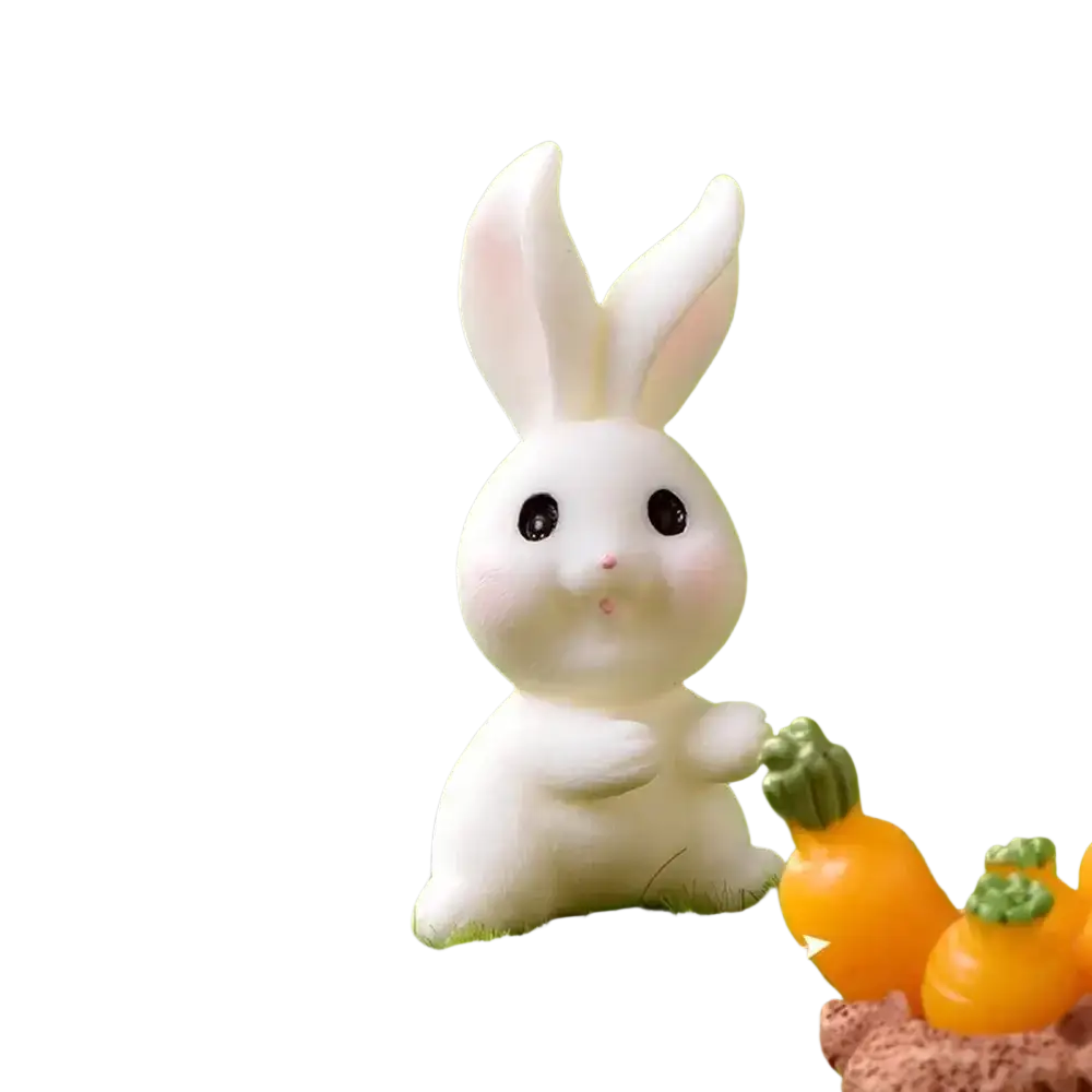A cute white resin bunny figurine holding a carrot for easter garden and cake decor