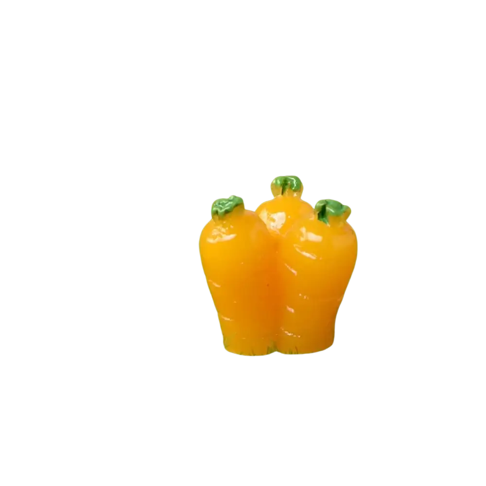Three miniature orange carrots with green tops made of glossy plastic in resin bunny figurine Easter garden decor