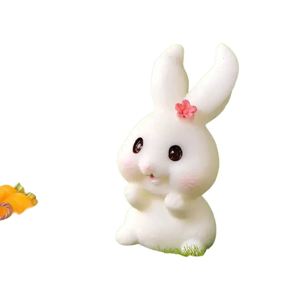 White ceramic resin bunny figurine with pink floral ear decor and glossy black eyes for easter garden and cake decor