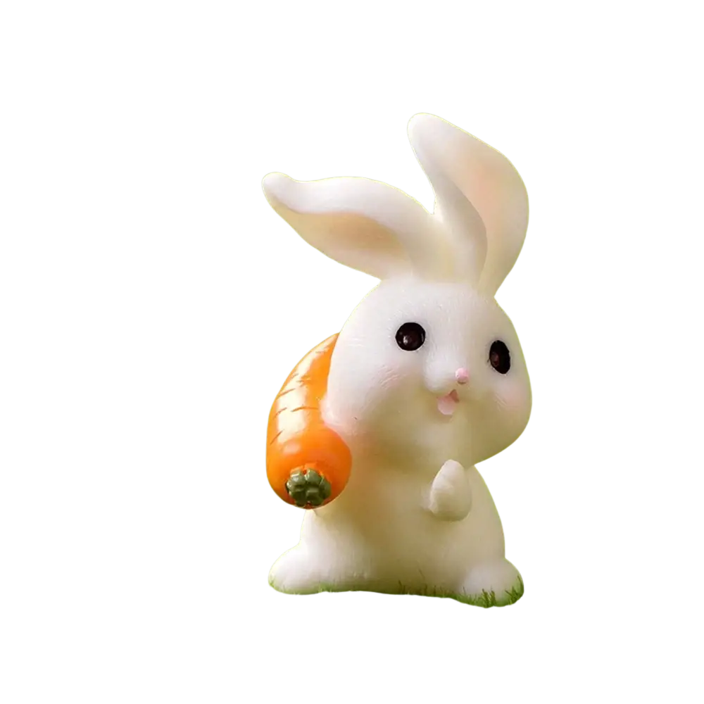 White ceramic resin bunny figurine holding an orange carrot for easter garden and cake decor