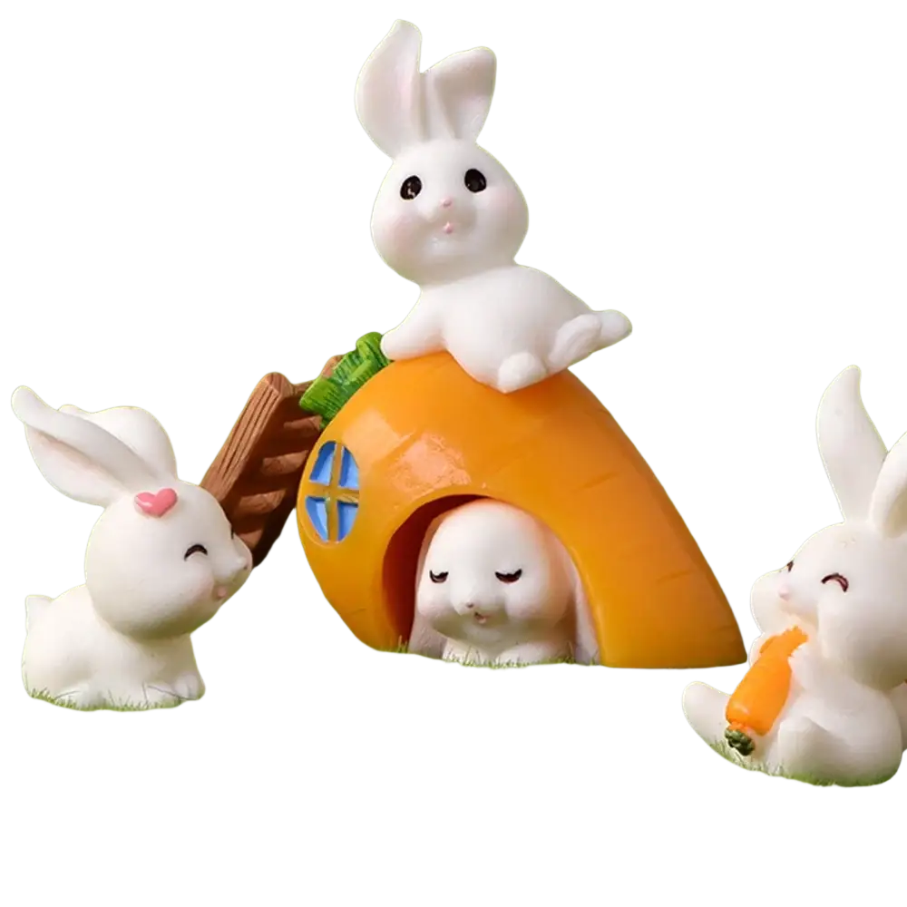 White plastic resin bunny figurine sitting atop orange carrot-shaped house with blue window panes for easter decor