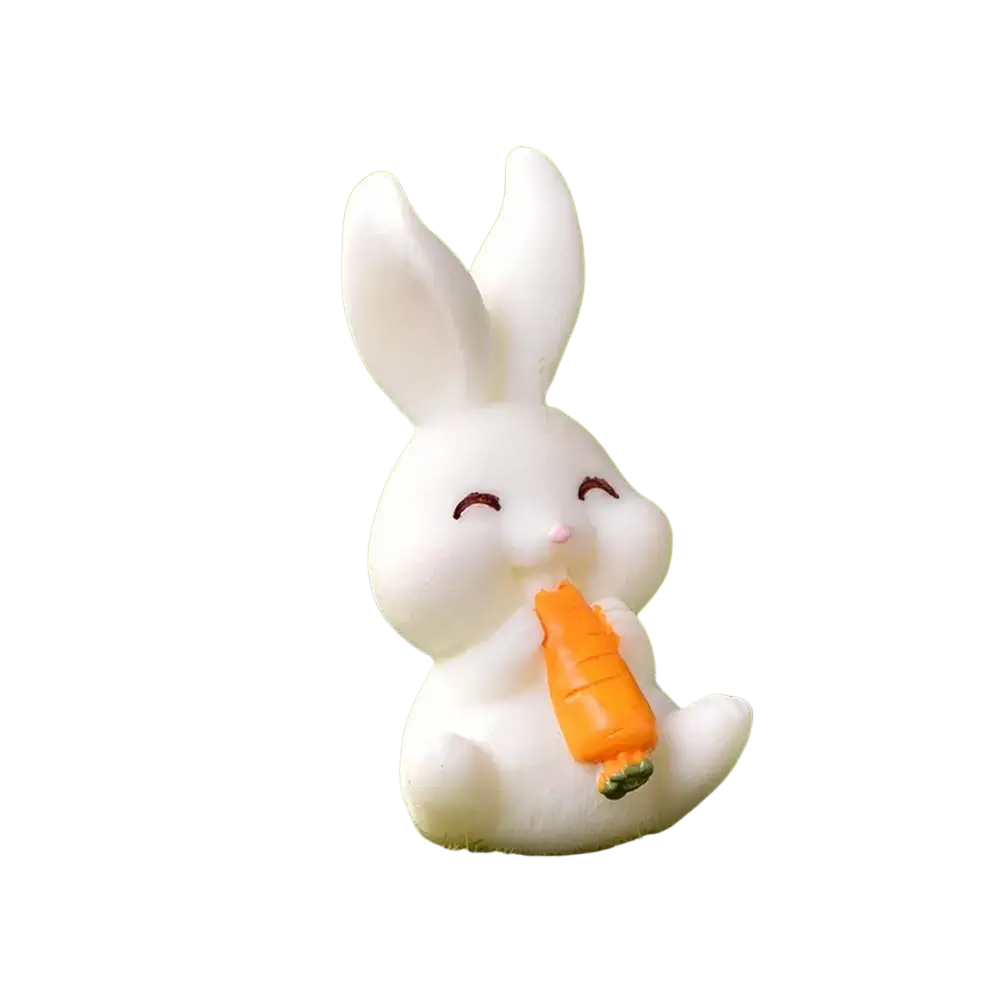 Resin white bunny figurine holding an orange carrot for Easter garden and cake decor 3.9cm tall 2.3cm wide