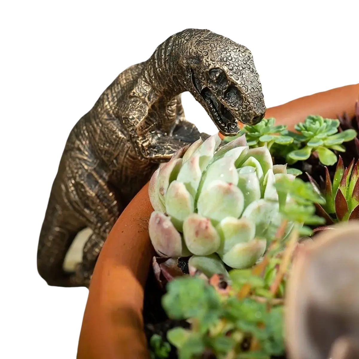 Bronze-colored resin climbing dinosaur flower pot ornament with textured design perched on a terracotta pot rim