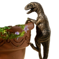 Bronze resin climbing dinosaur flower pot ornament featuring textured scales and an open mouth for garden decor