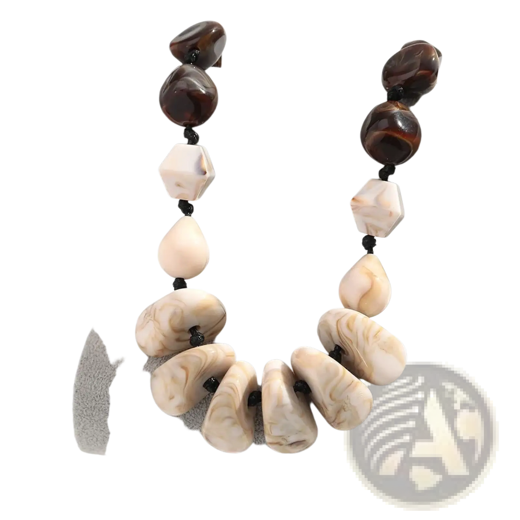 Resin geometric marbled beaded choker necklace with alternating dark brown glossy beads and cream-colored stones