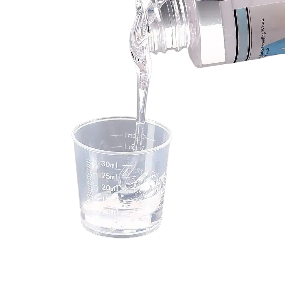 Clear plastic measuring cup with milliliter markings for resin mixing in casting tools kit for jewelry making