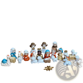 Resin nativity scene manger home decor set with miniature porcelain figurines in colorful robes around a central manger
