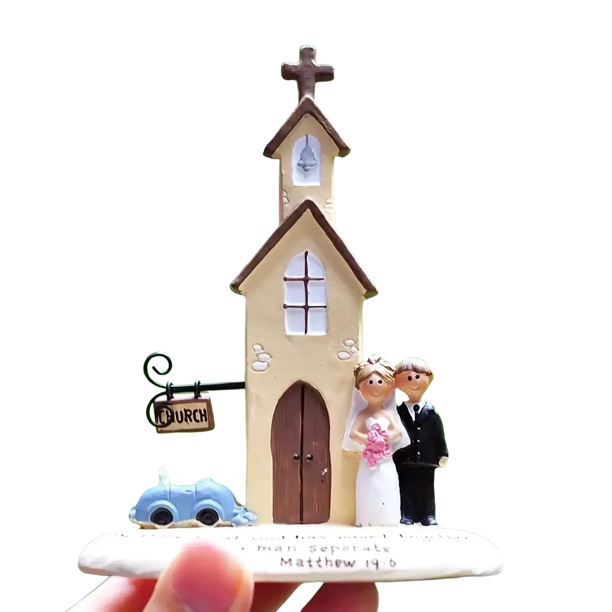 Beige resin wedding church figurine with brown roof and doors topped by cross featuring bride and groom anniversary gift