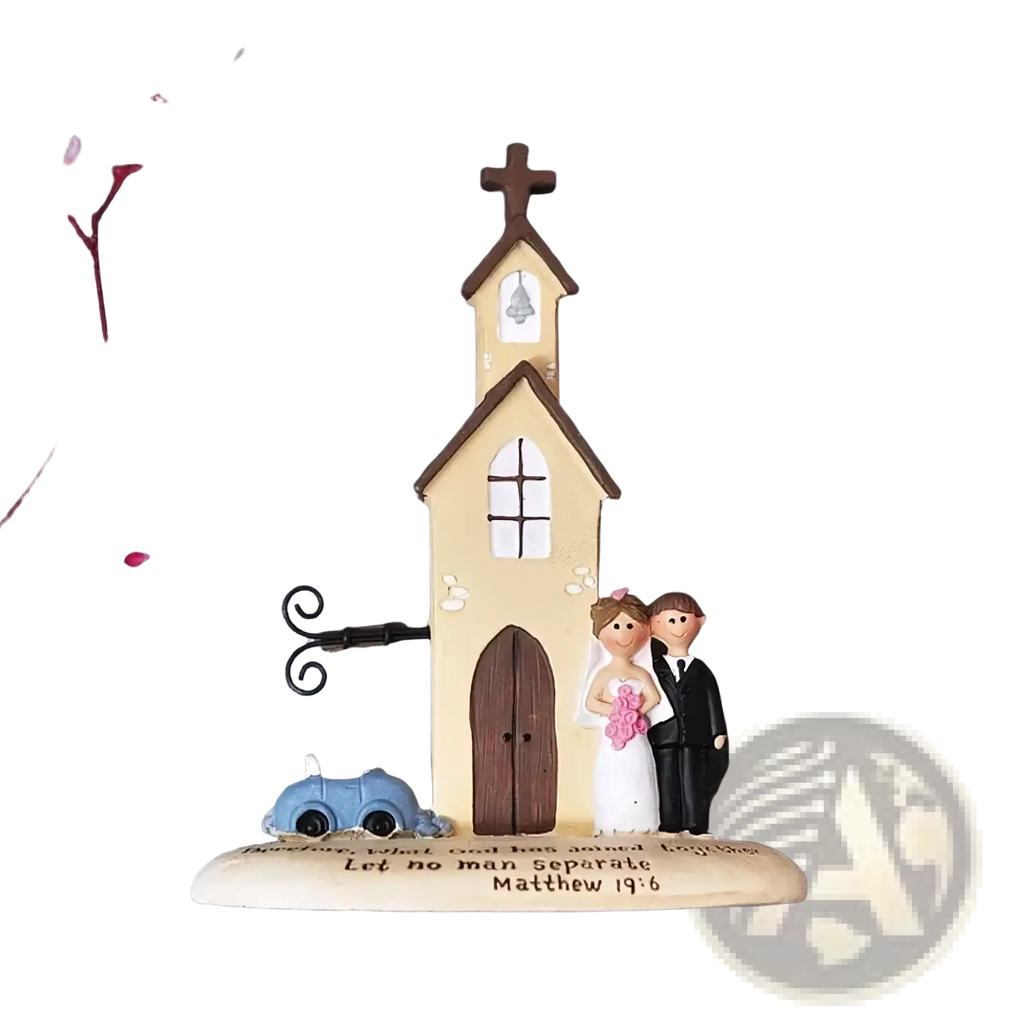Beige resin wedding church figurine with brown cross bell bride in white holding pink flowers groom in black attire and blue car