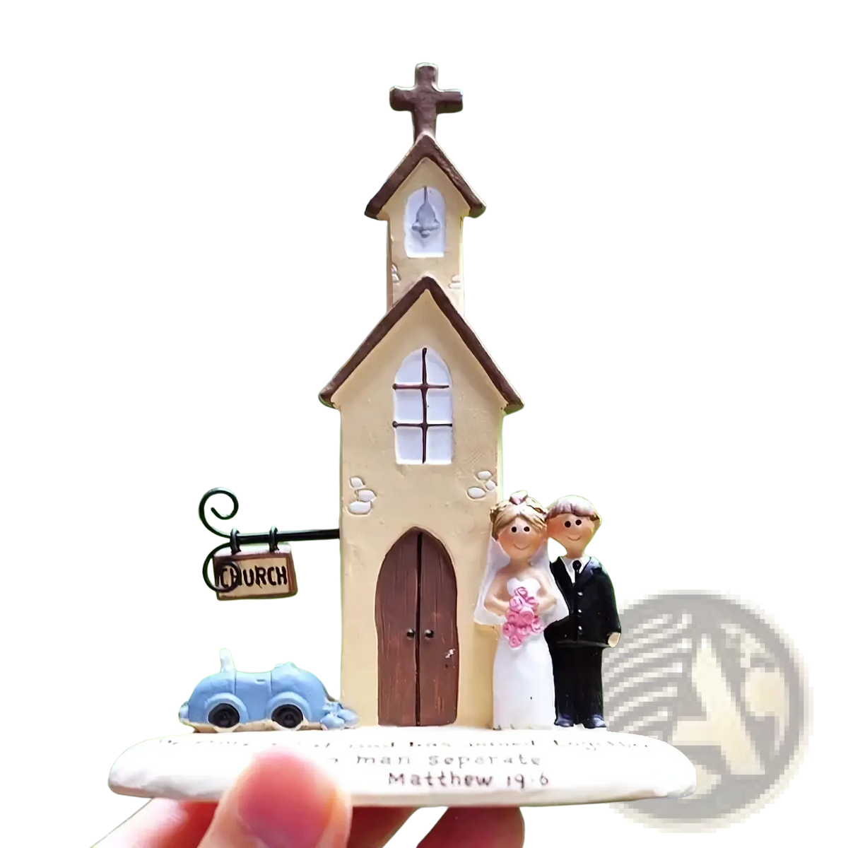 Beige resin wedding church figurine with brown roof and cross featuring tiny bride and groom anniversary gift