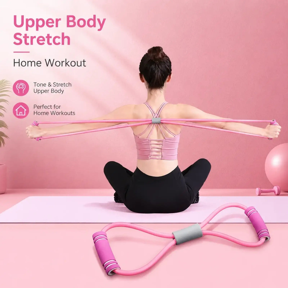 Resistance band with foam handles in pink featuring padded grips and a central gray grip for upper body stretching