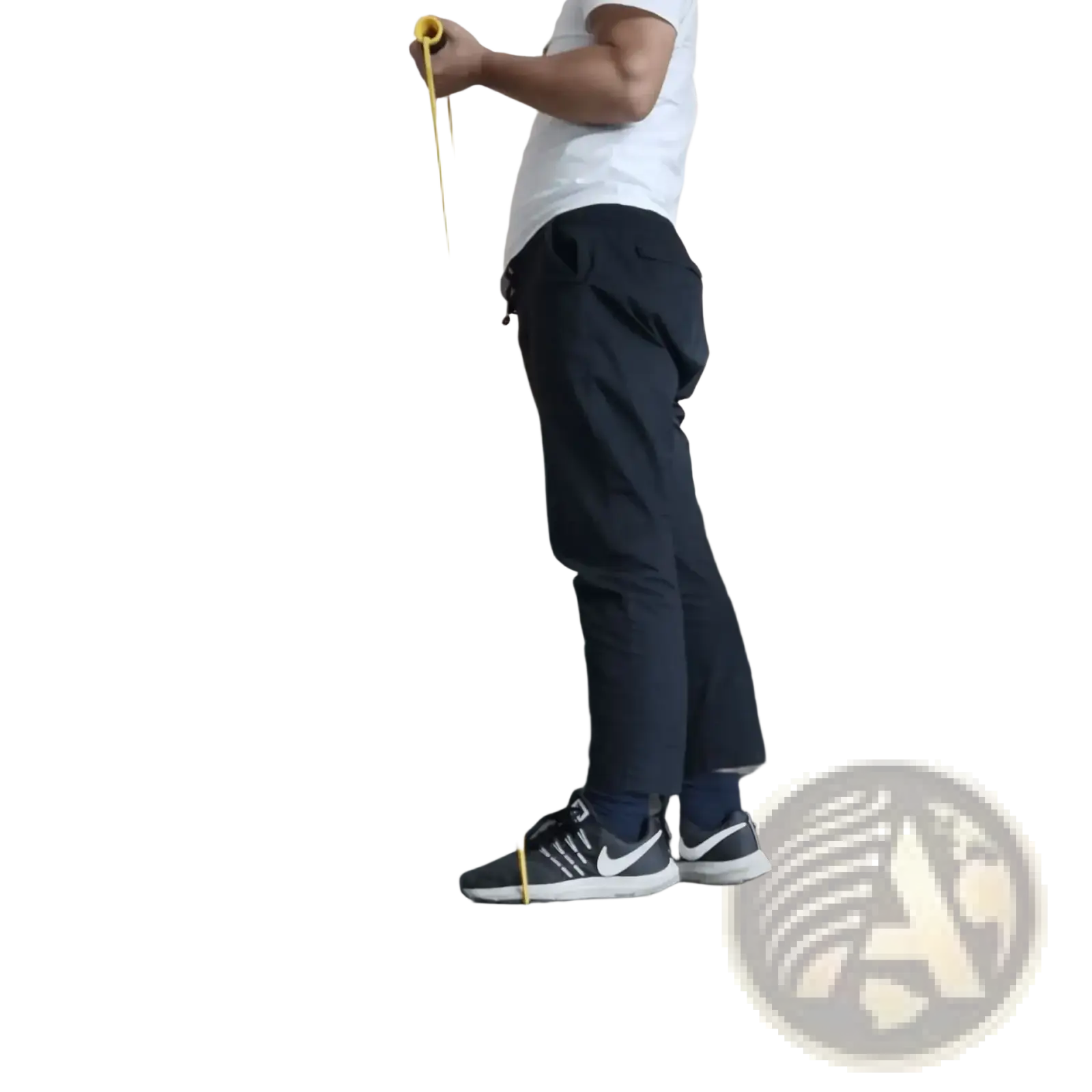 Yellow resistance band with replacement grips held in hand showing elastic material for strength training use