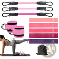 Pink resistance band set with black handles and ankle cuffs for home gym leg and hip toning system