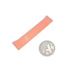 A peach-colored 10lb resistance band with smooth rubber texture and printed branding for fitness and pilates workout