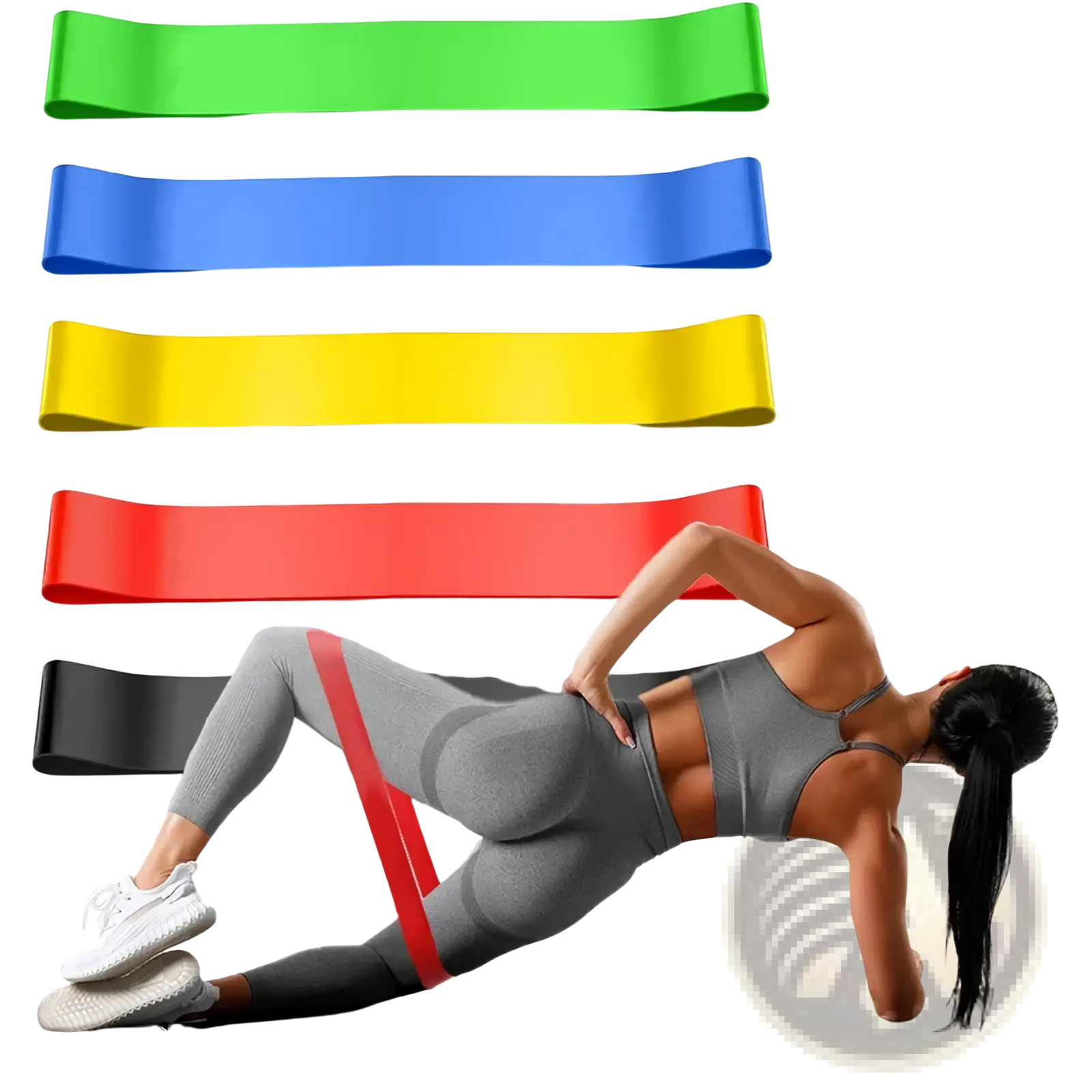 Set of five colorful resistance bands in green blue yellow red and black for workout and fitness use
