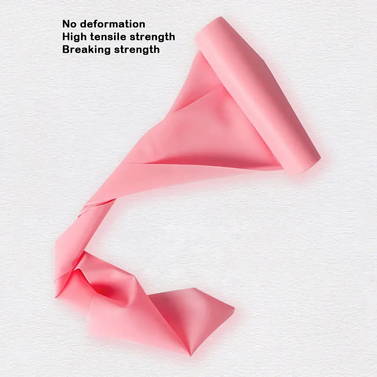 Pink resistance band for working out made of smooth elastic material with reinforced ends for fitness exercise